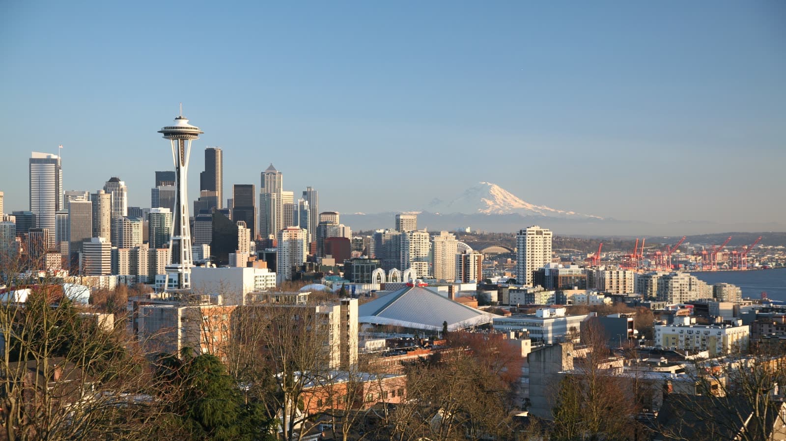 The Space Needle and downtown Seattle skyline with Mount Rainier in the distance, seen from Queen Anne.